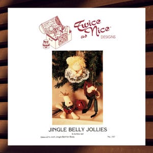 May include: A Christmas-themed craft pattern featuring three handmade ornaments: an angel, a reindeer, and an elf. The angel is adorned with a lace collar, the reindeer has antlers, and the elf wears a pointed hat. The text reads "JINGLE BELLY JOLLIES" and the ornaments are 6 inches tall.