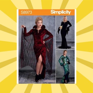 May include: Simplicity pattern S8973 features three costume designs. The main image shows a woman in a long, dark red velvet dress with a high collar and a sheer black cape. Other designs include a black gown and a green dress.