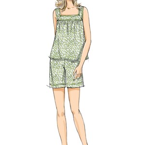 May include: Illustration of a woman in a two-piece pyjama set. The top is a tank style with a square neckline and the shorts have an elasticated waistband. The pyjamas are white with a green abstract pattern and green trim.