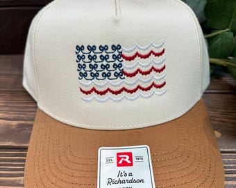 Ribbons and Bows American Flag embroidered trucker hat just in time for summer!