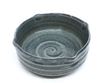 BLUE POTTERY BOWL is a Glazed Ribbed Ringware Ceramic Stoneware Brush Pot / Paint Dish in a Mottled Denim Blue Round Snail Shell Like Design