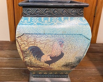 METAL PLANTER is an 18" tall Blue, Green and Gold Cachepot with a Large Painted Rooster on 4 Sides and 4 1/2" Bronze Tone Half-Ring Handles