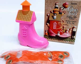 AVON COLLECTIBLE "One Two Lace My Shoe Bubble Bath" is a Pretty Hot Pink & Orange Plastic Boot Shaped Bottle NEW in the Original Avon Box