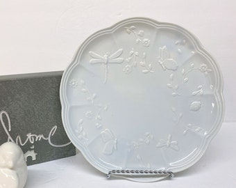 Butterfly & Dragonfly Cake Plate is a 10 1/4" Glazed Scalloped Pale Blue Ceramic w/Raised Relief Butterflies and Dragonflies Circling Dish
