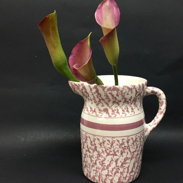 STUDIO ART POTTERY Pitcher is an 8" Glazed Ivory Ceramic Stoneware Pitcher Sponged in Mauve Pink with a 1/2" Wide Mauve Pink Center Band