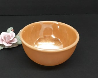 FIRE-KING OVENWARE Collectible Shiny Iridescent Peach LustreWare Bowl measures 6" across Smooth Opening and stands 3" tall - Circa 1952-63
