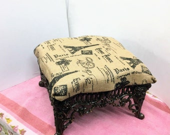 Antique Victorian Foot Stool Covered in an Eiffel Tower Parisian Themed Print Burlap Upholstery over a Heavy Ornate Filigree Cast Iron Base