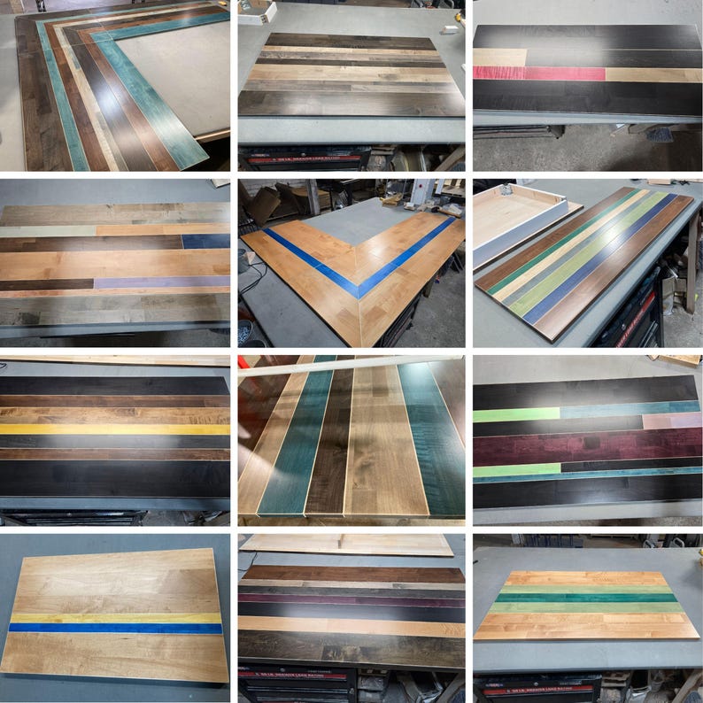 May include: A collection of rectangular wooden tabletops featuring various patterns of multi-colored planks. The surfaces display a mix of natural wood tones, stained finishes, and vibrant painted stripes in blue, green, yellow, and red hues.
