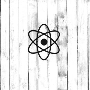 May include: A black atom symbol is centered on a white wooden plank background. The atom symbol is a stylized representation of an atom, with a central circle surrounded by orbiting lines. The background has a rustic, weathered appearance.