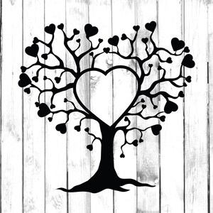 May include: A black silhouette of a tree with a heart-shaped opening in the centre. The tree is surrounded by small hearts, creating a romantic and whimsical design.