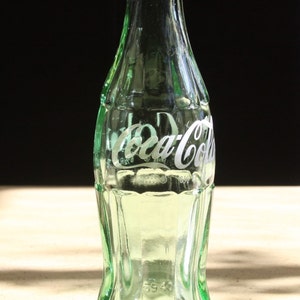 Botella Coca Cola vintage de Filadelfia, Pensilvania, 1969. SIN astillas ni grietas. Excelente estado. Ideal para publicidad vintage o colecciones de Coca Cola.