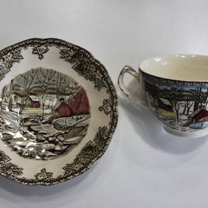 Vintage English China Tea Cup and Saucer. Made by Johnson Bros. The Ice House, Friendly Village Design. No Chips or Cracks. Great Condition.