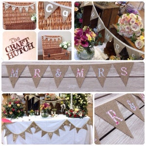 May include: A collage of burlap banners and signs for a wedding or event. The banners display phrases like "Cards", "Mr & Mrs", and other words. The letters are in various fonts and colors, with floral patterns.