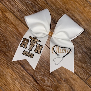 Lazo para birrete de graduación de RN 2026