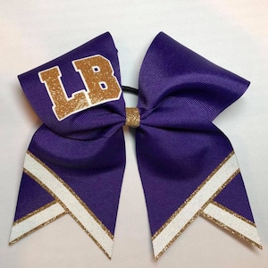 Monogrammed purple, old gold and white glitter cheer bows