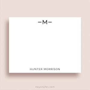 May include: White stationery card with black text. The text reads " -M- " and "HUNTER MORRISON" and "naysnotes.com".