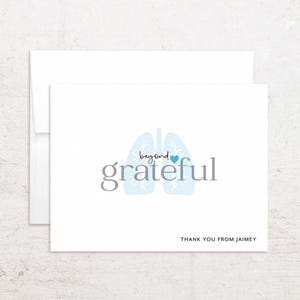 May include: A rustic wooden sign with the text "Welcome to our home" in white lettering. The sign features a distressed finish and a simple, inviting design, perfect for front door decor.