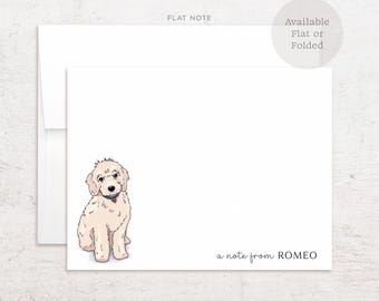 May include: A white stationery note card featuring a light-colored doodle dog illustration with a blue collar and red heart tag. The text "a note from ROMEO" is printed in the bottom right corner. The card is paired with a white envelope.