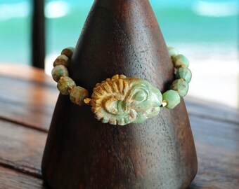 Handcrafted Ram Amulet Bracelet: Turquoise & Gold Beads, Ancient Symbol