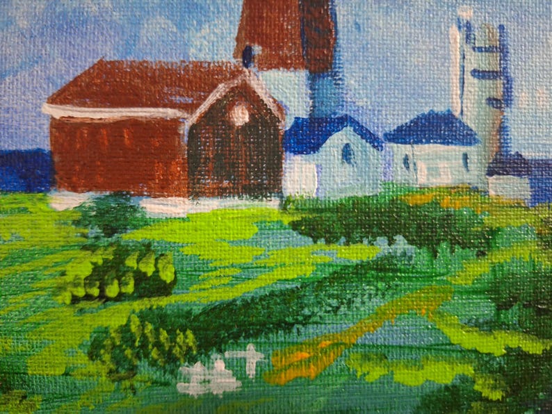 May include: A painting of a small town with a red barn, a white church, and a blue sky. The buildings are surrounded by green grass and trees.