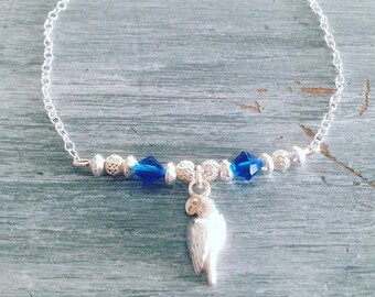 Bracelet in silver and Swarovski Parrot bird