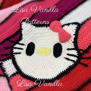 May include: A white crocheted Hello Kitty character with black eyes, a pink bow, and a yellow nose. The character is on a red, pink, and white striped crocheted blanket. The text "Lisa Vanilla Patterns" is visible in the image.