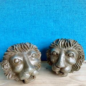 Lions Head Paper Weights / Bookends. Distressed Golden Lion Head. 2 lbs. 4.5&quot; high