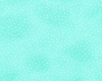 May include: A light blue background with a white polka dot pattern.