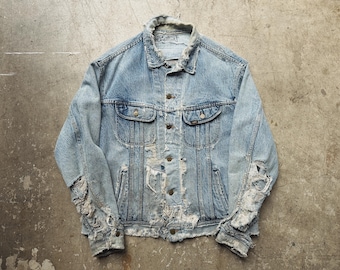 Thrashed and Repair-stitched vintage Lee denim jacket