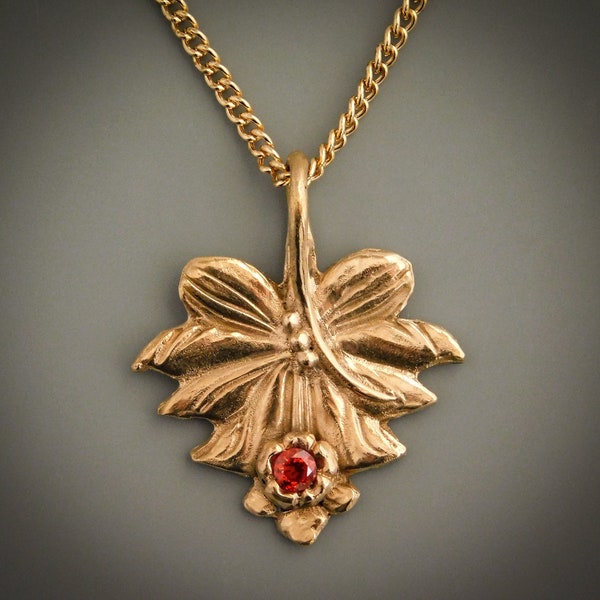 Art Deco Style Floral Sculpted Jewelry Grade Yellow Bronze Pendant with Inset Red Fire Agate Cubic Zirconia and Vine Style Bail