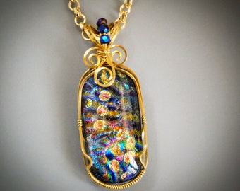 Layered Dimensional Elongated Oval Dichroic Fused Glass Cabochon Wire Wrap Set in Yellow Bronze with Czech Crystals