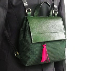 Small leather and canvas backpack or green leather purse