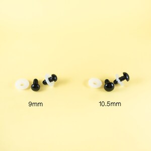 May include: Two sets of black plastic safety eyes for crafts. The set on the left is 9mm in diameter and the set on the right is 10.5mm in diameter. Each set includes two eyes and two white plastic washers.