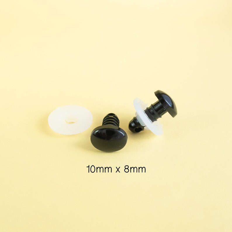May include: Two black plastic safety eyes with white plastic washers, measuring 10mm x 8mm.