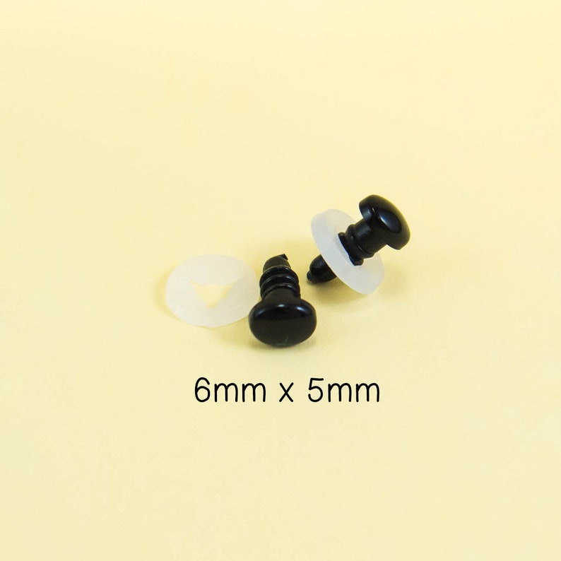 May include: Two black plastic safety eyes with white plastic washers. The eyes are 6mm in diameter and 5mm in height.