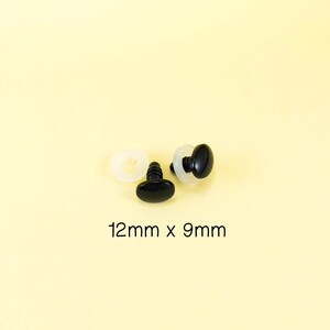 May include: Two black plastic safety eyes with white plastic washers, measuring 12mm x 9mm.