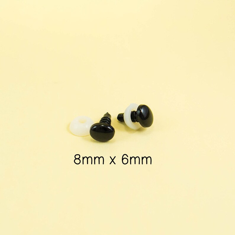 May include: Two black plastic safety eyes with white plastic washers. The eyes are oval shaped and measure 8mm x 6mm.