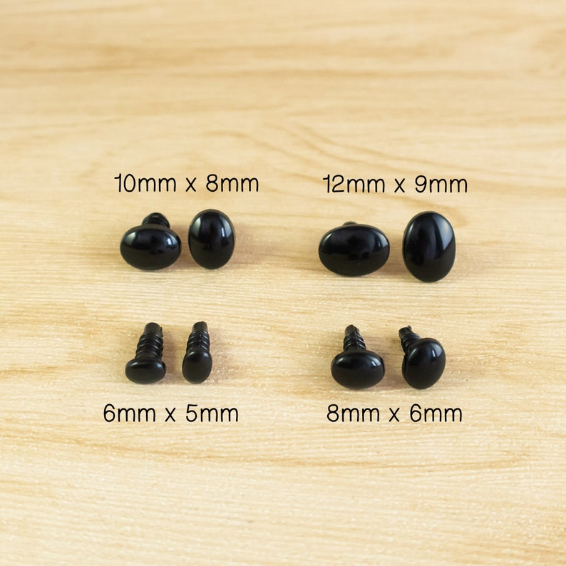 May include: Assortment of black plastic safety eyes for crafts.  The eyes come in four sizes: 6mm x 5mm, 8mm x 6mm, 10mm x 8mm, and 12mm x 9mm.