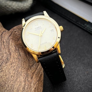 Timex 1990&#39;s Indiglo Ladies Gold Date Window Dial Quartz Watch