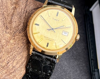 Relógio retrô masculino Timex Viscount 1975, data dourada, mostrador com janela, movimento automático