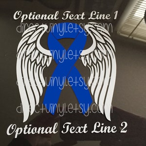 May include: White angel wings with a blue ribbon in the centre. The text "Optional Text Line 1" and "Optional Text Line 2" is below the wings.