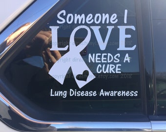 White Awareness Ribbon Cure Vinyl Window Decal (Lung Cancer, Lung Disease, Blindness, Bone Cancer, Bone Disease, Retinoblastoma)