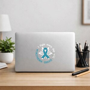 May include: A circular sticker featuring a teal awareness ribbon centered over a white snowflake graphic. The text "I fight every day with MYASTHENIA GRAVIS" is printed in a circular pattern around the ribbon in a teal sans-serif font.