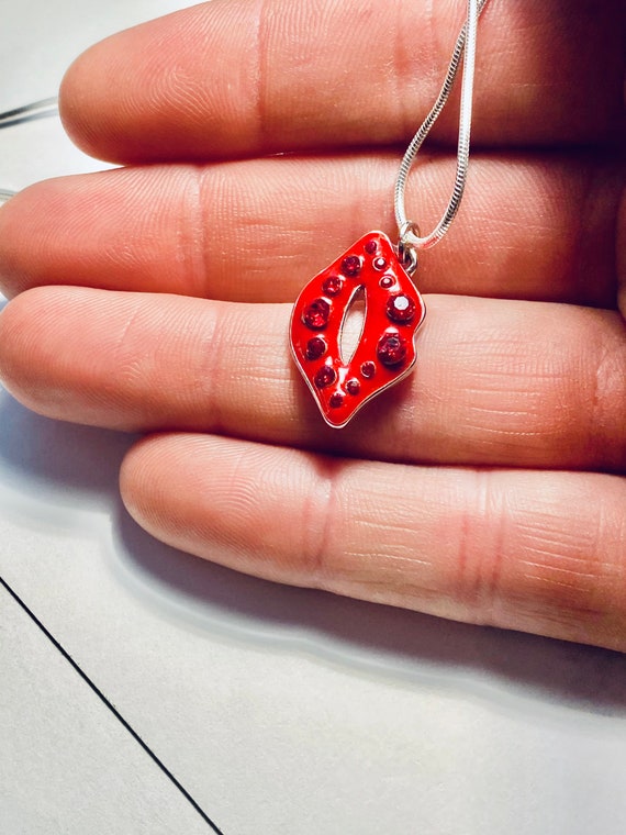 Swarovski lip necklace best sale