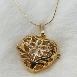 Gold heart shaped locket clearance