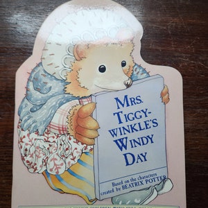 Mrs. Tiggy-Winkle&#39;s Windy Day activity book cut-outs paperdolls Beatrix Potter peter rabbit Mr. Toad