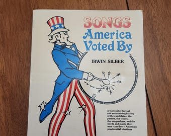 Canciones votadas por Estados Unidos por Irwin Silber, libro de música en rústica