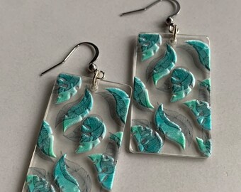 Rectangular resin earrings with turquoise leaves on transparent silver metal alloy hook