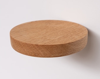 Small round floating shelf by TOMAZIN
