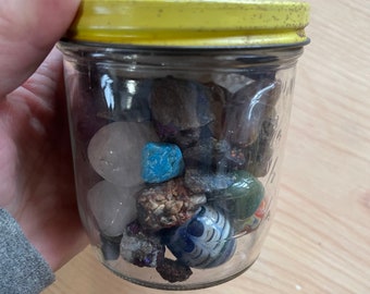 Vintage marbles & rocks in a vintage peter pan peanut butter jar